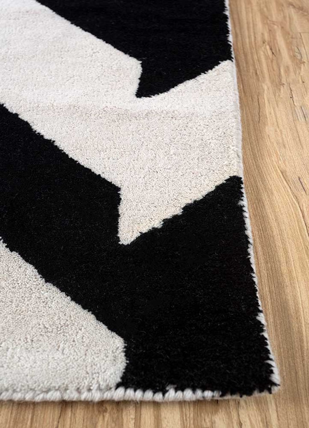 Wollteppich - 148 x 235 cm - schwarz-weiß