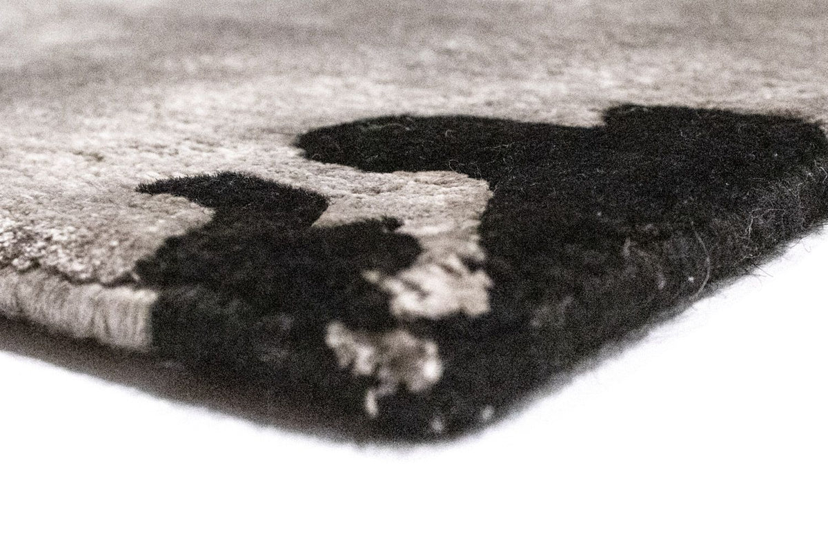 Designer Teppich 172 x 241 cm - schwarz