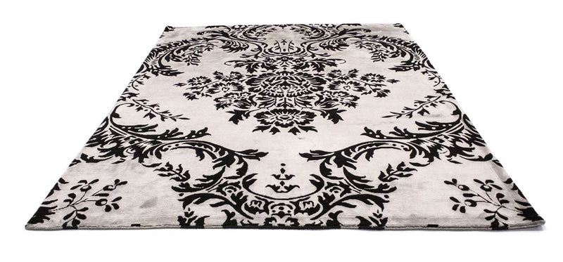 Designer Teppich 172 x 241 cm - schwarz
